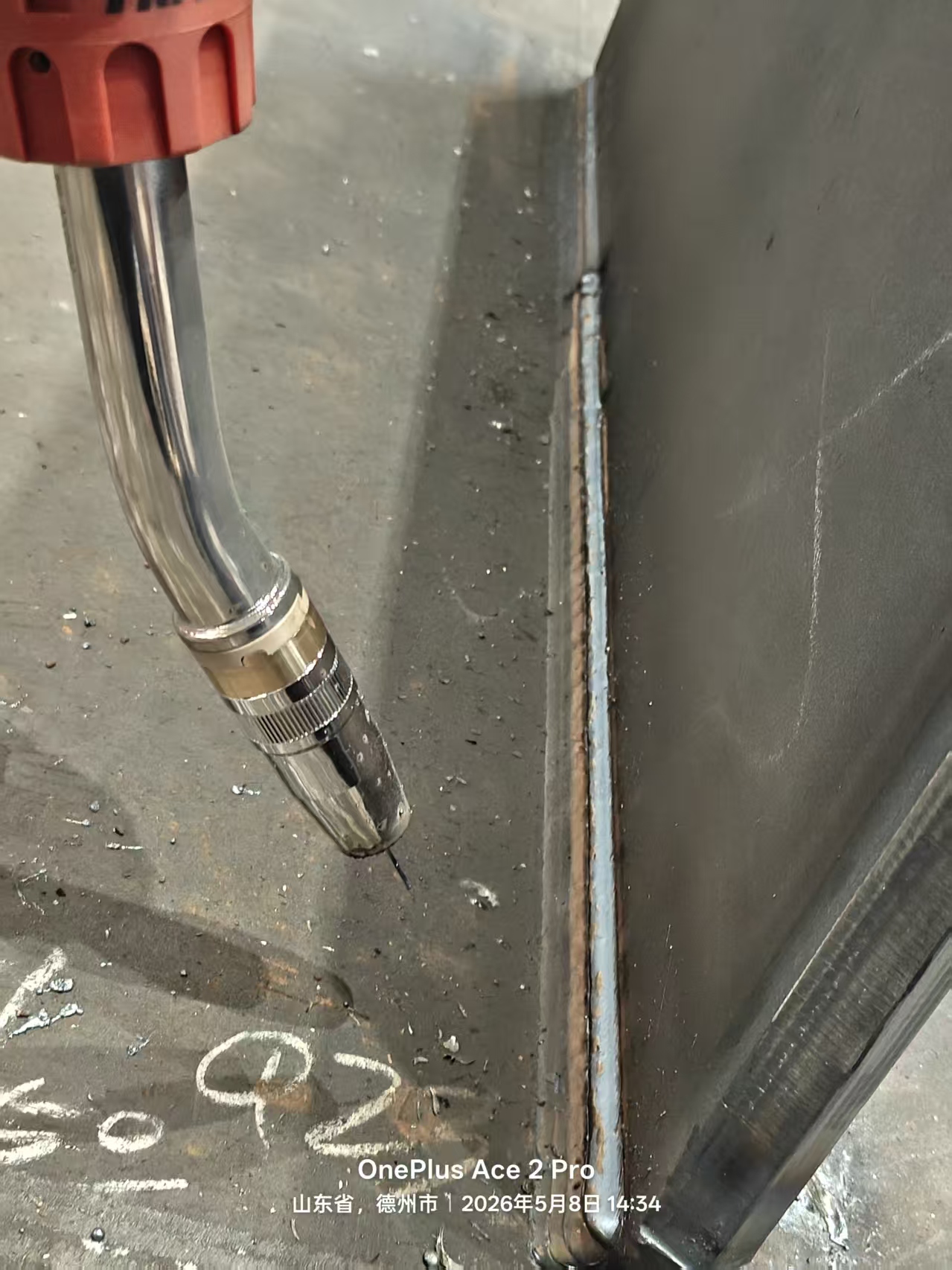 Laser-guided welding robot locating a metal joint